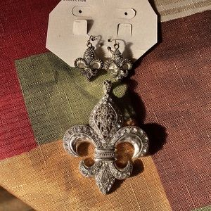 Earrings and matching necklace pendant.